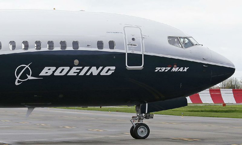 A Boeing 737 MAX 9 airliner rolls out for its first flight last year in Renton, Wash. Under Boeing’s deal with Embraer, Boeing will own 80 percent of a partnership running the Brazilian jet-maker’s commercial airplane and services businesses.  