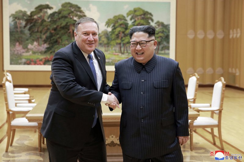 FILE - In this May 9, 2018, file photo provided by the North Korean government, U.S. Secretary of State Mike Pompeo, left, shakes hands with North Korean leader Kim Jong Un during a meeting at Workers' Party of Korea headquarters in Pyongyang, North Korea. In his first post-summit visit to Pyongyang on Friday, July 6, 2018, Pompeo is hoping to pin Kim down on all the things the North Korean leader danced around in his talks with U.S. President Donald Trump in Singapore.Korean language watermark on image as provided by source reads: &quot;KCNA&quot; which is the abbreviation for Korean Central News Agency. (Korean Central News Agency/Korea News Service via AP, File)