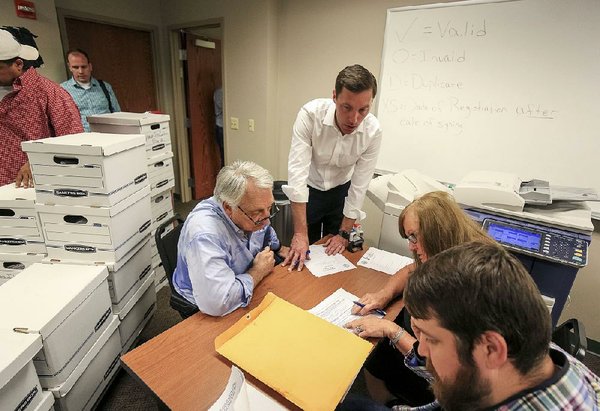 Signed Petitions Offered To Get 3 Issues On Arkansas Ballot | The ...