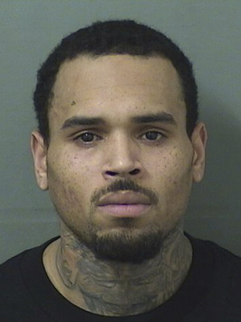 This booking photo provided by Palm Beach County Sheriff's Office shows Chris Brown. The singer walked off stage after his concert in Florida and into the hands of waiting sheriff&#x2019;s deputies, who arrested him on a felony battery charge and booked him into the Palm Beach County Jail. A sheriff&#x2019;s spokeswoman said the entertainer was released after posting $2,000 bond on the battery charge issued by the sheriff&#x2019;s office in Hillsborough County. No details about the allegations in the arrest warrant were immediately available. (Palm Beach County Sheriff's Office via AP)