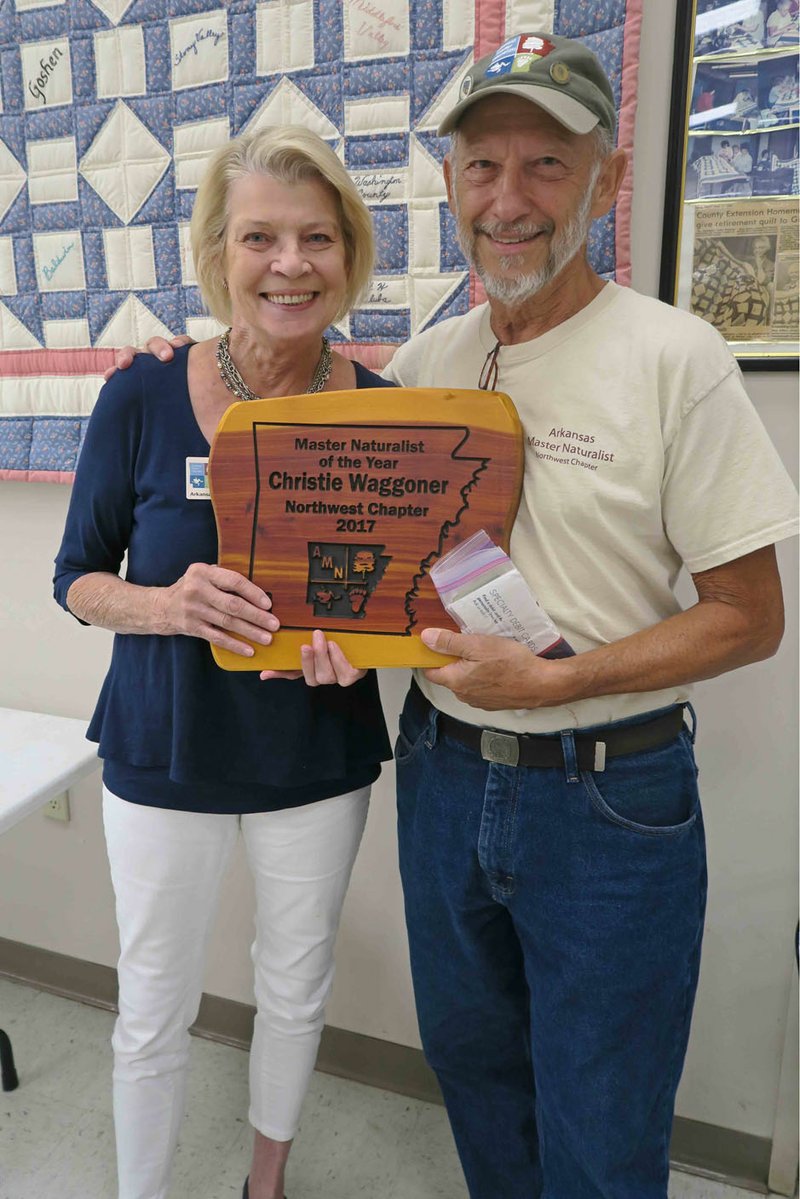 photo submitted The Northwest Master Naturalists recognized several members for outstanding service during 2017 at the June membership meeting in Fayetteville. Christie Waggoner (left) was named the Master Naturalist of the Year for 2017. Steve Sanders presented the award to Waggoner, citing her tireless efforts to expand the outreach and education programs while also contributing an exemplary number of hours as a chapter board member and working at maintaining natural areas for state and local agencies. Sampers also credited her with having a significant impact on the group's rapid growth as training class enrollments have nearly tripled over the past three years.