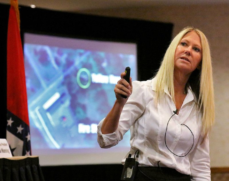 Carly Posey, whose children survived the 2012 shooting at Sandy Hook Elementary School in Newtown, Conn., speaks Monday during the Arkansas Safe Schools Conference in North Little Rock. 
