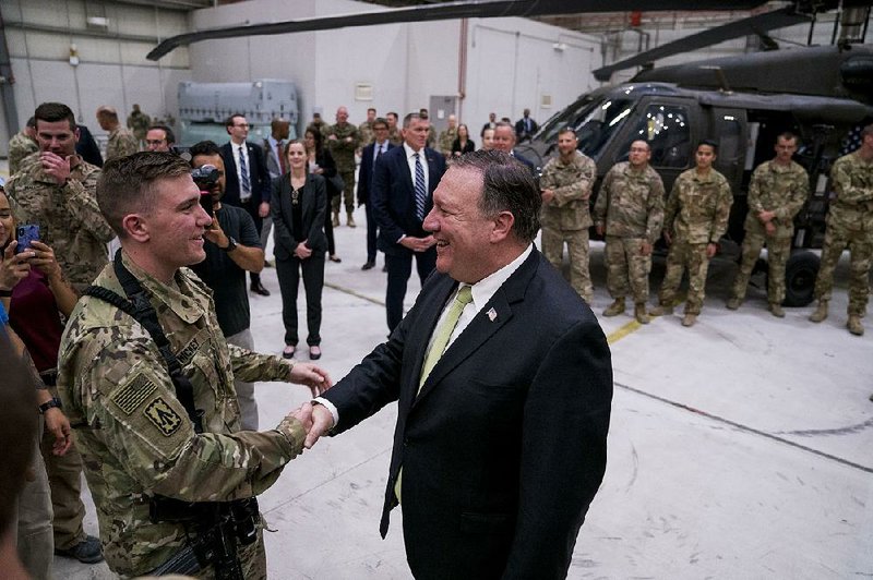 Secretary of State Mike Pompeo meets with coalition forces Monday at Bagram air base in Afghanistan.  