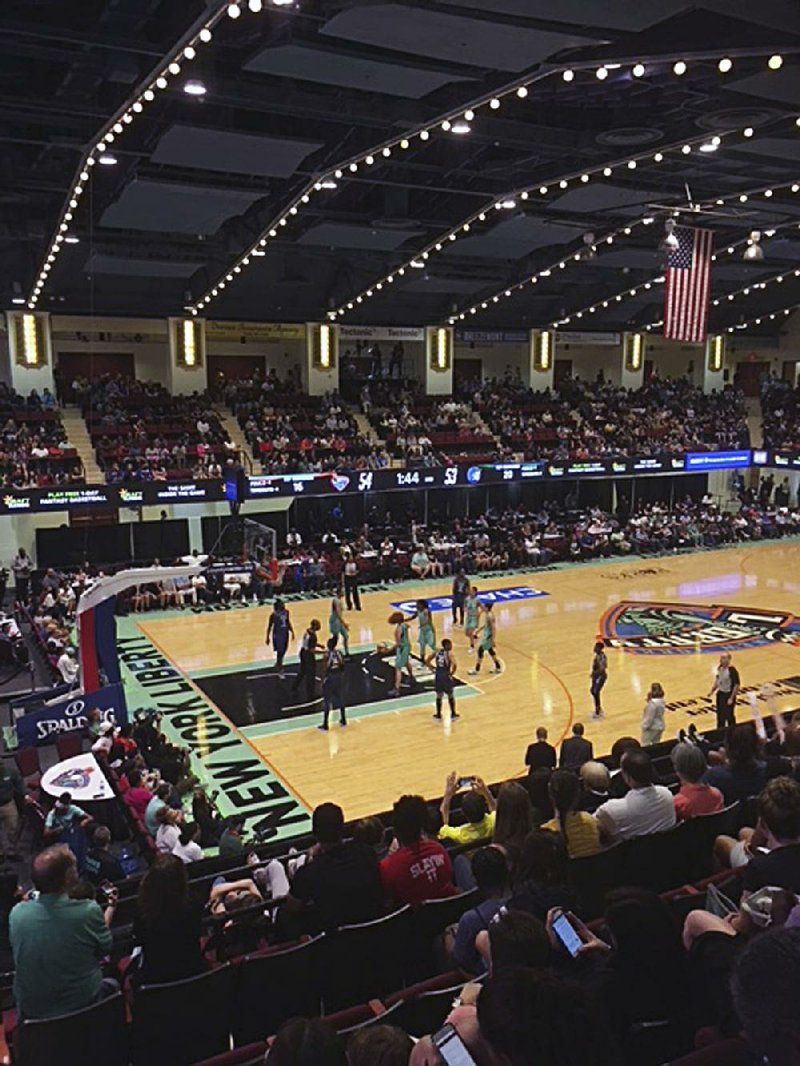 The New York Liberty and Minnesota Lynx play in a WNBA game May 26 at the Westchester County Center in White Plains, N.Y. WNBA teams have been going with smaller venues the past few years, allowing them to save money and create a more intimate experience for fans. 