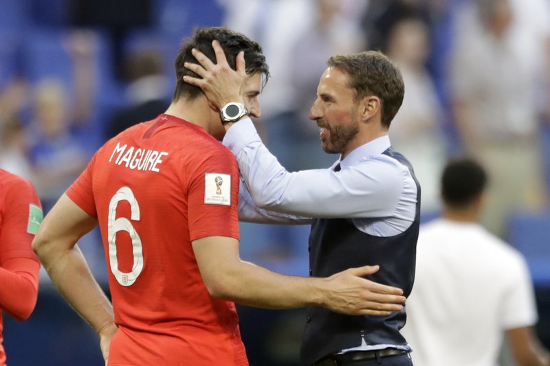 The Associated Press ANOTHER WIN: England head coach Gareth Southgate, right, celebrates his team's quarterfinal victory over Sweden Saturday with Harry Maguire at the 2018 FIFA World Cup in Samara, Russia.