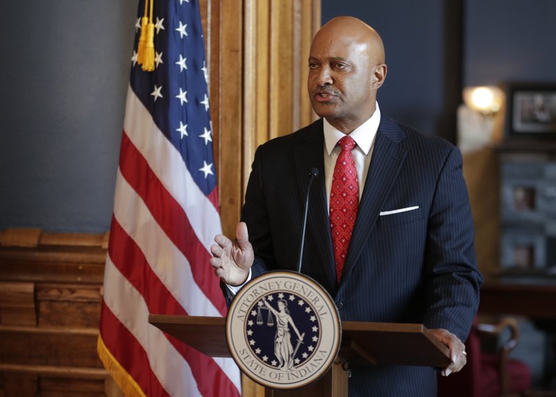 Indiana Attorney General Curtis Hill speaks during a news conference at the Statehouse in Indianapolis, Monday, July 9, 2018. Hill is rejecting calls to resign, saying his name &quot;has been dragged through the gutter&quot; amid allegations that he inappropriately touched a lawmaker and several other women. The Republican said during the news conference that he stands &quot;falsely and publicly accused of abhorrent behavior.&quot; (AP Photo/Michael Conroy)