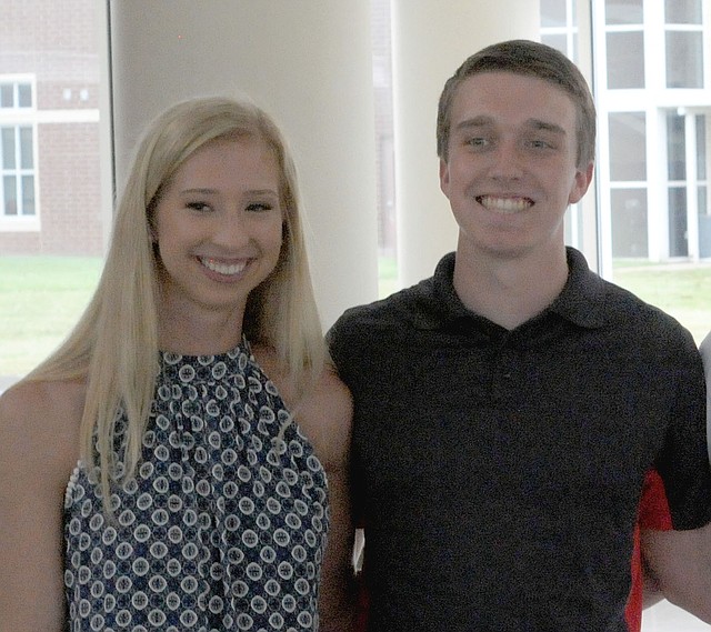 MARK HUMPHREY ENTERPRISE-LEADER Prairie Grove 2018 graduate, Sarah James Stone (left) and Farmington 2018 graduate, Javan Jowers, shared a romance in the midst of the rivalry between the two schools. Stone played basketball for the Lady Tigers while Jowers played football for the Cardinals.