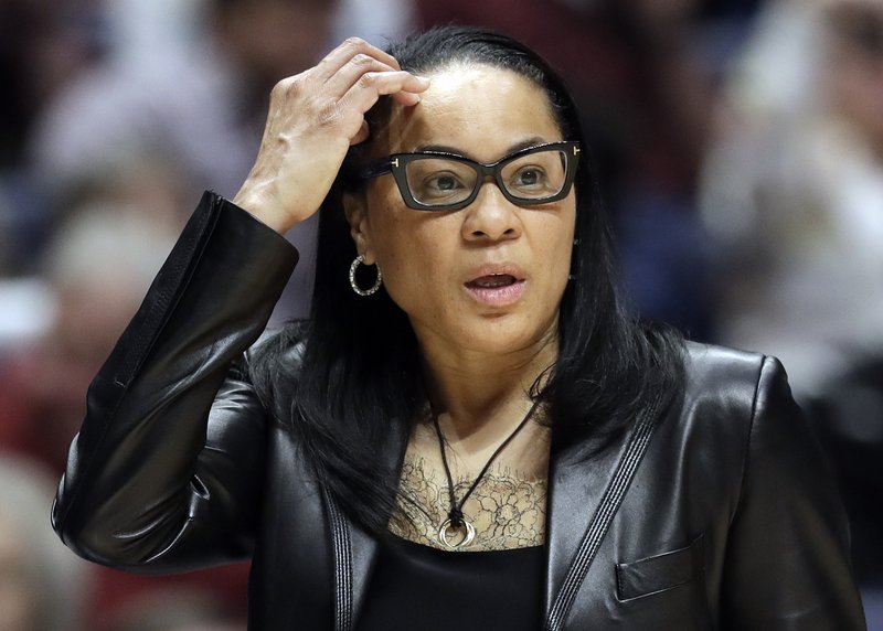 South Carolina head coach Dawn Staley watches the second half of an NCAA college basketball championship game against Mississippi State at the women’s Southeastern Conference Tournament March 4 in Nashville, Tenn. 