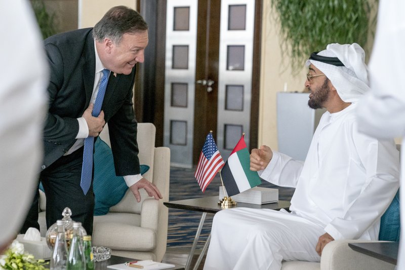 U.S. Secretary of State Mike Pompeo, left, and Abu Dhabi's Crown Prince Sheikh Mohammed bin Zayed Al Nahyan meet at the Al Shati Palace in Abu Dhabi, United Arab Emirates, Tuesday, July 10, 2018. Pompeo is on a trip traveling to North Korea, Japan, Vietnam, Afghanistan, Abu Dhabi, and Brussels. (AP Photo/Andrew Harnik, Pool)