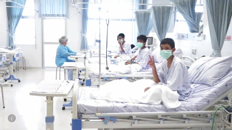 In this image made from video, released by the Thailand Government Spokesman Bureau, three of the 12 boys are seen recovering in their hospital beds after being rescued along with their coach from a flooded cave in Mae Sai, Chiang Rai province, northern Thailand. (Thailand Government Spokesman Bureau via AP)