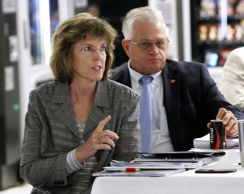 Arkansas Department of Correction Director Wendy Kelley (left) answers a question during the Board of Corrections meeting Wednesday at the Wrightsville Unit. 