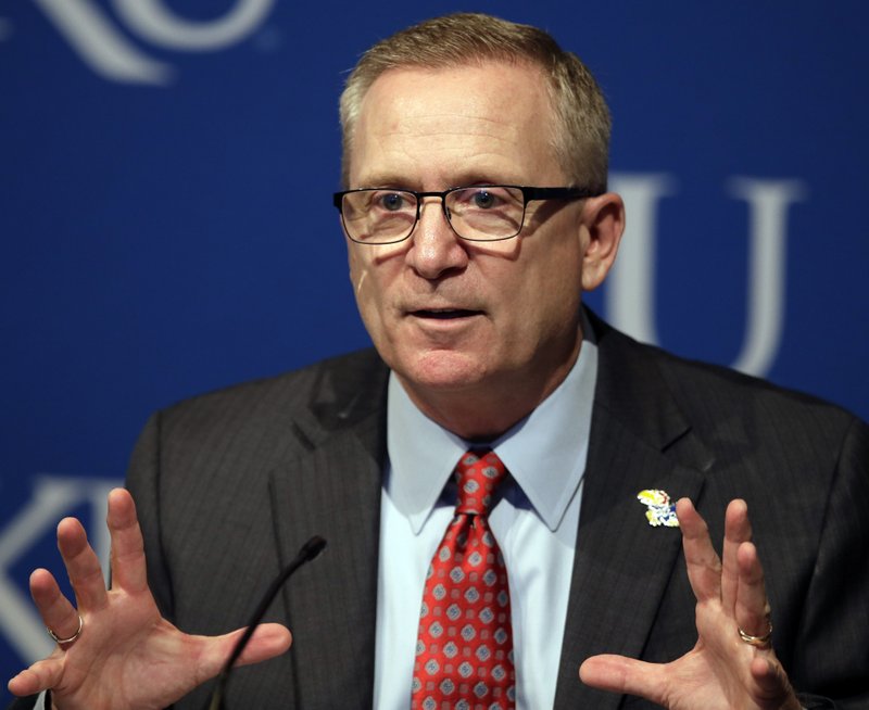 The Associated Press THE LONG ROAD: New Kansas Athletic Director Jeff Long answers questions Wednesday during a news conference in Lawrence, Kan. Long plans to focus on bringing a winning culture to the Jayhawks football team.