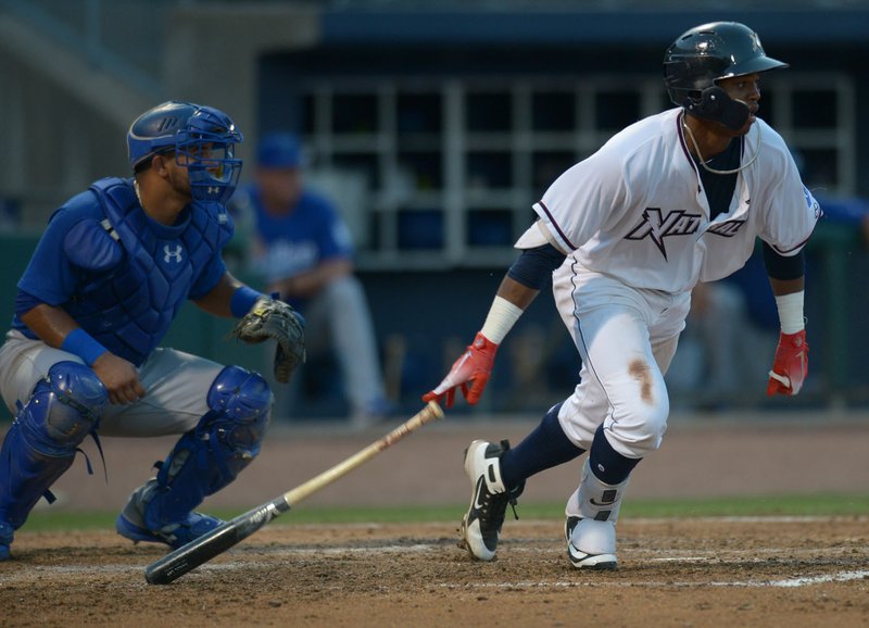 NWA Democrat-Gazette/ANDY SHUPE Northwest Arkansas Naturals left fielder Khalil Lee connects for an RBI single to score designated hitter Anderson Miller against the Tulsa Drillers Wednesday, July 11, 2018, during the fourth inning at Arvest Ballpark in Springdale. Visit nwadg.com/photos to see more photographs from the game.
