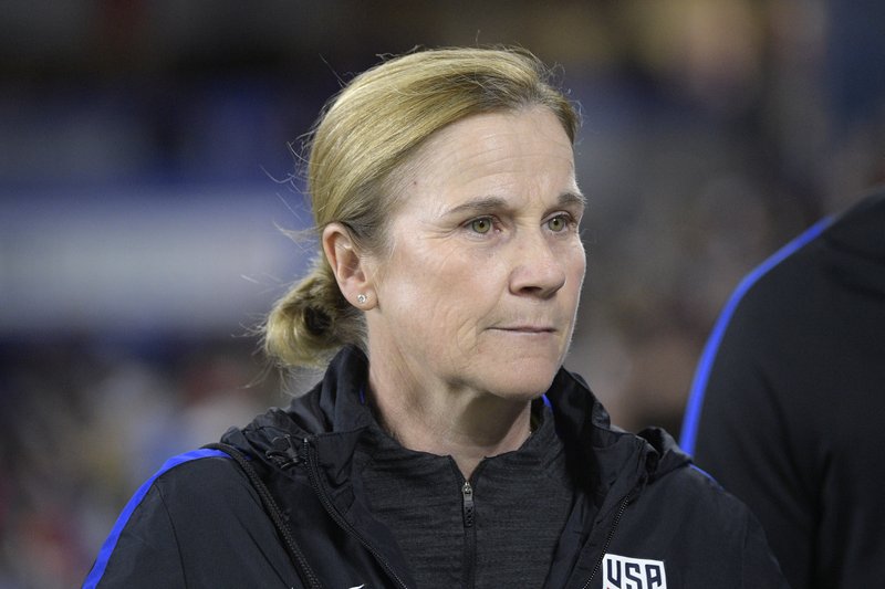  In this March 7, 2018, file photo, United States head coach Jill Ellis walks onto the field before a SheBelieves Cup women's soccer match against England, in Orlando, Fla. 