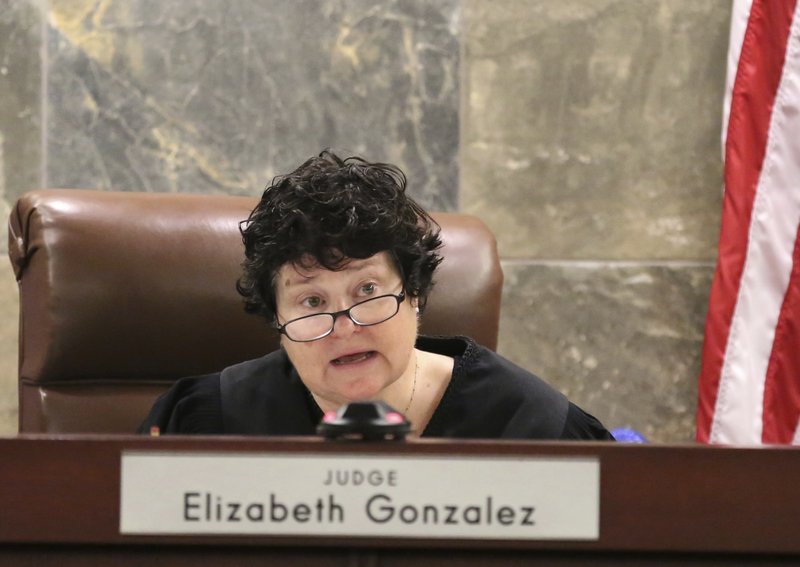 Judge Elizabeth Gonzalez announces her decision at the Regional Justice Center during a hearing on Wednesday, July 11, 2018, in Las Vegas. Drug manufacturer Alvogen filed suit in an effort to stop Nevada using their drugs in the execution of death row inmate Scott Dozier. Gonzalez ordered the delay Wednesday morning in response to a challenge by New Jersey-based drugmaker Alvogen, which says it doesn't want its product, midazolam, used in "botched" executions. (Bizuayehu Tesfaye/Las Vegas Review-Journal via AP)