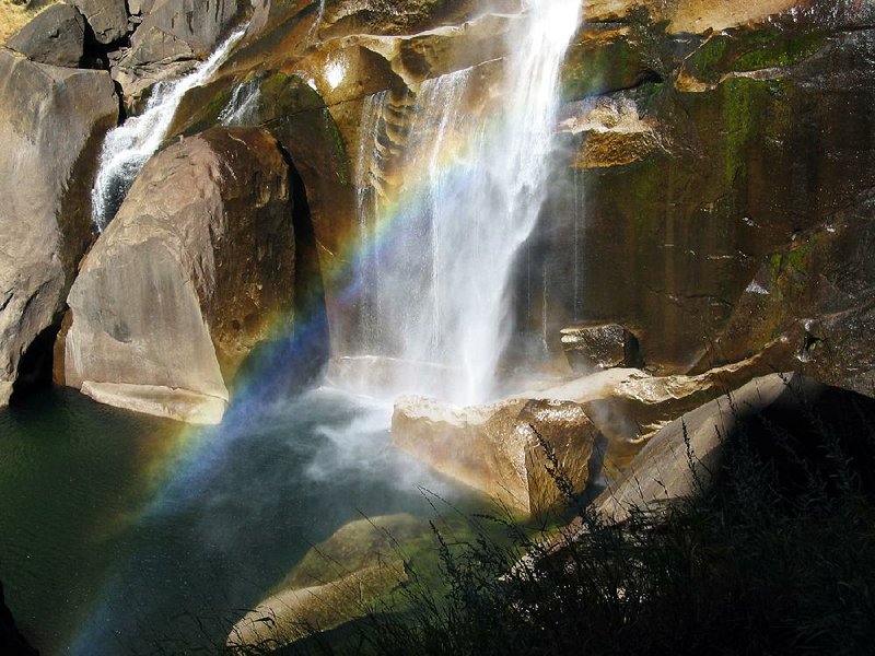 The mists of Vernal Falls create a rainbow in Yosemite National Park. Visitors to the park can buy passes in advance through YourPassNow.  