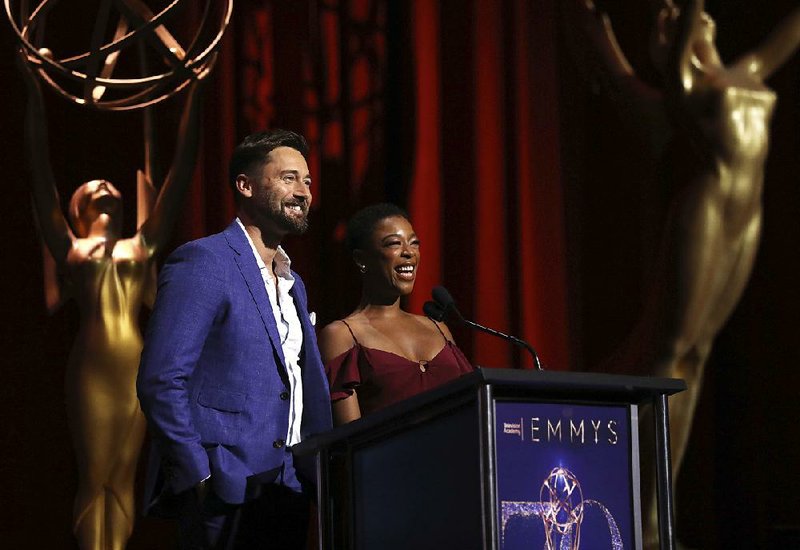 Ryan Eggold and Samira Wiley present Emmy nominations Thursday in Los Angeles. Wiley was surprised to learn that she was nominated in the best guest actress in a drama series category for her role in The Handmaid’s Tale.  