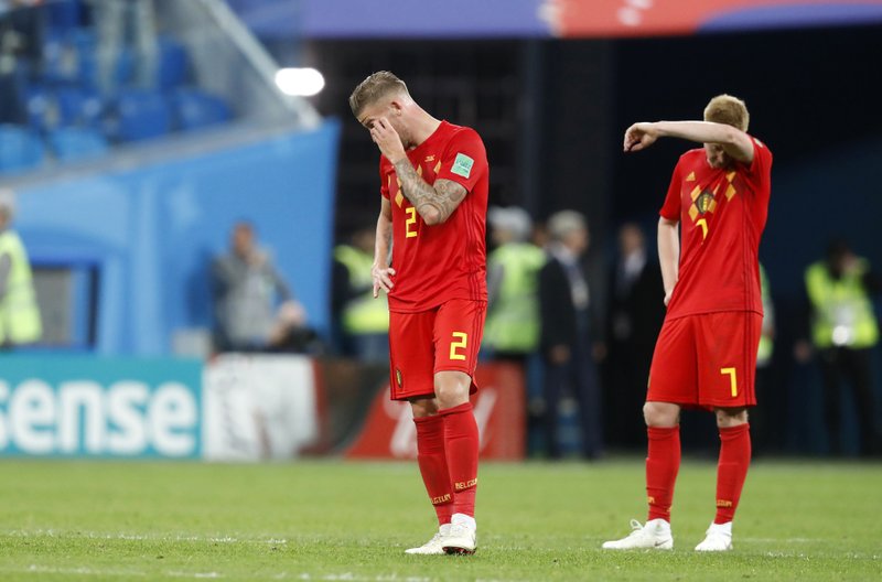 The Associated Press PREMIER LEAGUE BATTLE: Belgium's Toby Alderweireld, left, and Kevin De Bruyne stand on the pitch at the end of the semifinal loss Tuesday to France at the 2018 FIFA World Cup in St. Petersburg, Russia. Alderweireld is among three Belgians who play for the Premier League's Tottenham, while De Bruyne is among two who play for Manchester City. England's Kyle Walker will take to the pitch against his Manchester City teammate, while England has five who play for Tottenham.