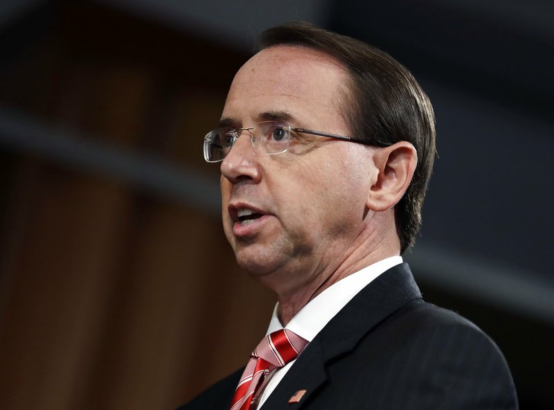 Deputy Attorney General Rod Rosenstein speaks during a news conference at the Department of Justice on Friday, July 13, 2018, in Washington.