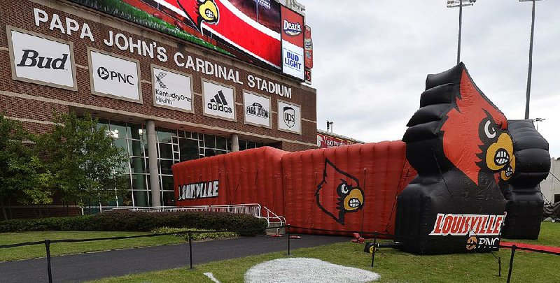 The University of Louisville is removing the name of sponsor Papa John’s off its stadium after reports that the company’s founder John Schnatter used a racial slur during a conference call in May.  