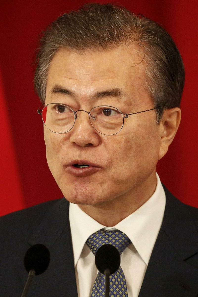South Korea President Moon Jae-in speaks during a press conference at the Istana Presidential Palace in Singapore, Thursday, July 12, 2018. 