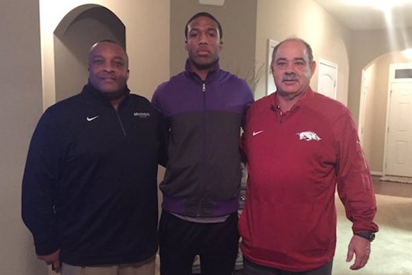 Arkansas freshman safety Myles Mason during his home visit with defensive backs coach Ron Cooper and defensive coordinator John Chavis.