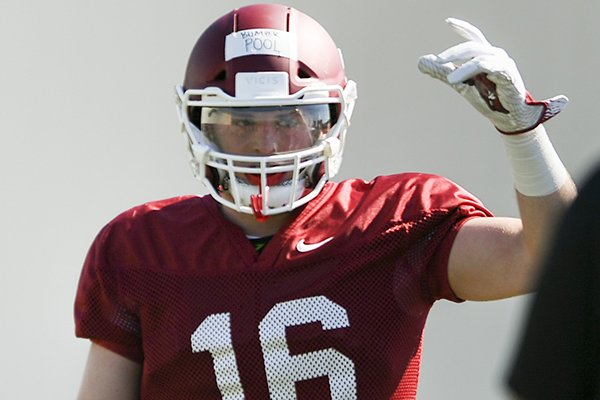 Arkansas linebacker Bumper Pool (16) goes through practice Saturday, March 3, 2018, in Fayetteville. 