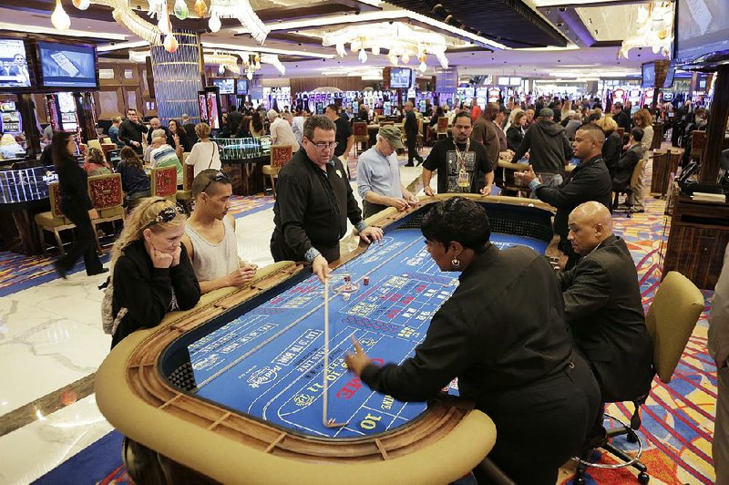 People gamble at the Hard Rock Hotel and Casino in Atlantic City, N.J., late last month.  

