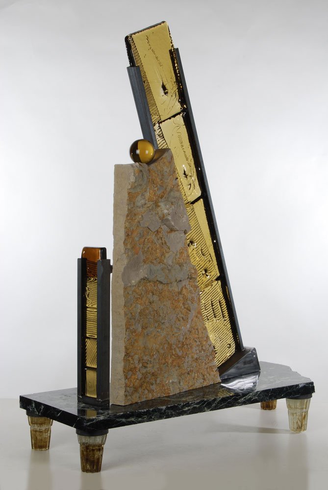 Courtesy Image Artist Ed Pennebaker has taken off down an environmental side road, making mixed media sculptures that use glass -- sometimes blown, sometimes cast, fused, hot worked, or cold worked -- in combination with steel, stone and found objects.