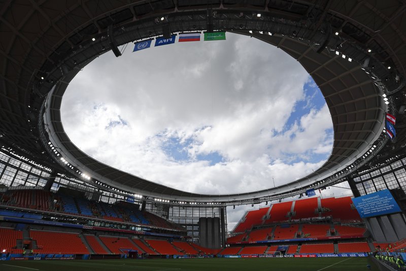 The Associated Press PROBLEM NOT TEMPORARY: This June 21 file photo shows the temporary stands, top right, at the Yekaterinburg Arena in Yekaterinburg, Russia, that were meant to show Russia was serious about saving money, but now two giant temporary stands symbolize the problems with World Cup legacy. The stands soar out of the arena, leaving fans exposed to the elements and with a feeling they're watching the game from a different arena entirely.