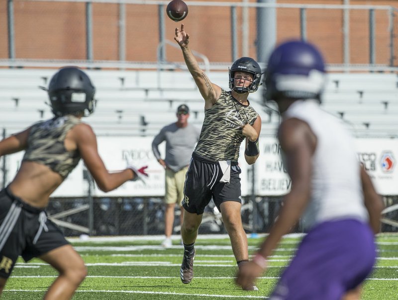 NWA Democrat-Gazette/BEN GOFF @NWABENGOFF Tate Robards, Broken Arrow quarterback, throws a pass Saturday, July 14, 2018, during the first finals game against Fayetteville in the Southwest Elite 7 on 7 Showcase at Shiloh Christian's Champions Stadium.