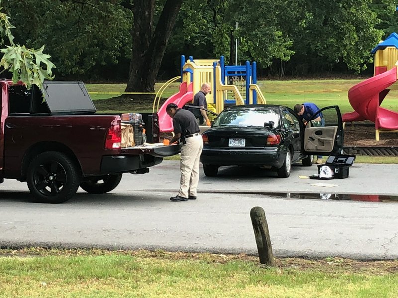 Police investigate a fatal shooting at a skate park in North Little Rock on Monday.