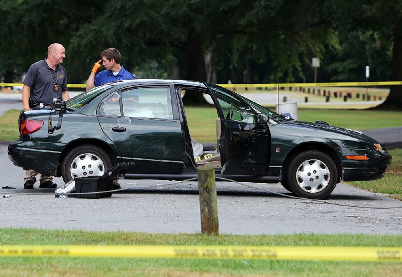 North Little Rock Police investigate an early morning shooting at Riverview Skateboard Park at 2800 River Road in North Little Rock on Monday. Police said officers found two people shot, one fatally, and the other was transported to a hospital.  