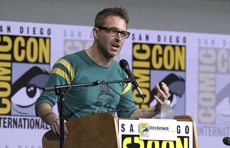 FILE - In this July 21, 2017 file photo, Chris Hardwick moderates the "Fear The Walking Dead" panel at Comic-Con International in San Diego. Hardwick, a mainstay at Comic-Con and moderator of numerous panels, stepped aside from moderating AMC and BBC America panels amid allegations from an ex-girlfriend, which Hardwick has denied. (Photo by Al Powers/Invision/AP, File)