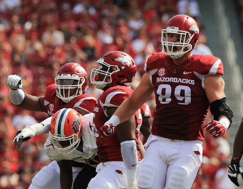 Mitchell Loewen, who played collegiately at Arkansas and is now a defensive lineman with the New Orleans Saints, helped a man escape from his SUV after it fell from the fourth floor of a parking garage and landed on its roof. “There’s not many moments that your heart pumps like that in your life,” he said. 