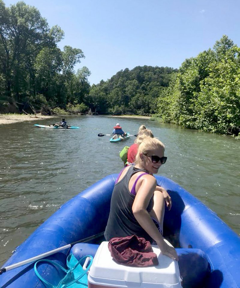 Janelle Jessen/Herald-Leader Jill Ellington, one of six new owners of Gypsy Camp and Canoe, enjoyed a recent float trip.