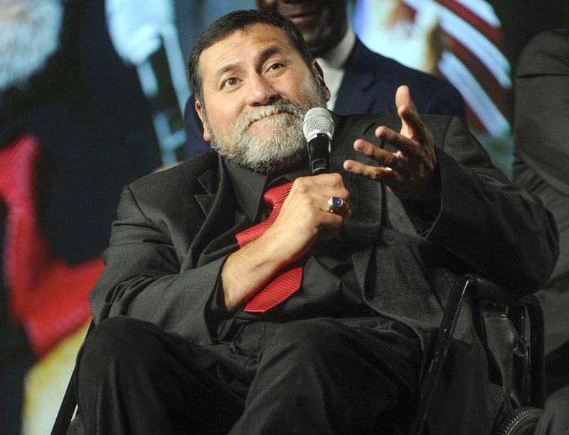 In this Aug. 28, 2013, file photo, inductee Gabe Rivera, from Texas Tech, is recognized during the National Football Foundation enshrinement ceremony in Atlanta. Rivera, a Texas Tech Ring of Honor member 
 passed away late Monday night, July 16, 2018, Texas Tech announced Tuesday. He was 57. (AP Photo/John Amis, File)