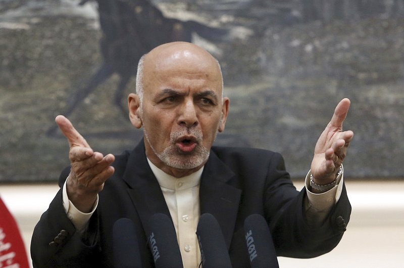 Afghan President Ashraf Ghani, speaks during, a press conference at the presidential palace in Kabul, Afghanistan, Sunday, July 15, 2018. (AP Photo/Rahmat Gul)
