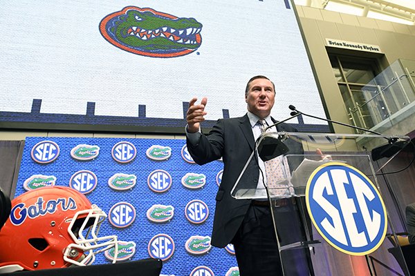 Florida head coach Dan Mullen speaks during the NCAA college football Southeastern Conference media days at the College Football Hall of Fame in Atlanta, Tuesday, July 17, 2018. (AP Photo/John Amis)

