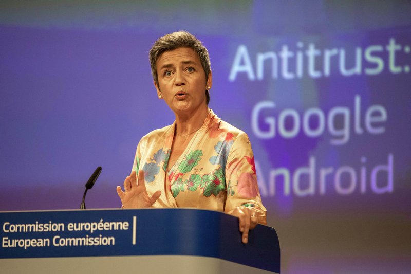 EU Commissioner Margrethe Vestager holds a press conference on a Competition Case involving Google Android at the European Commission building, in Brussels on Wednesday, July 18, 2018. he European Union's antitrust chief has fined Google a record $5 billion for abusing the market dominance of its Android mobile phone operating system. (AP Photo/Olivier Matthys)