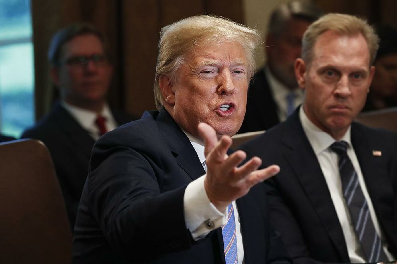 President Donald Trump on Wednesday again defended his handling of Russia, saying during a Cabinet meeting that no president before him had taken a tougher stance.  