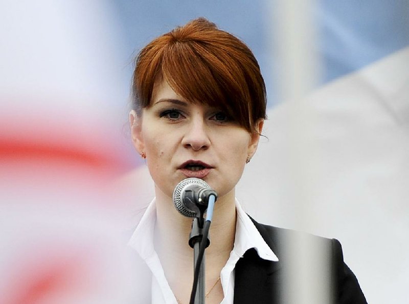 Maria Butina speaks during a 2013 rally in Moscow as an advocate for legalizing handgun possession. The Justice Department says the Russian gun-rights activist infiltrated U.S. political organizations including the National Rifle Association. 
