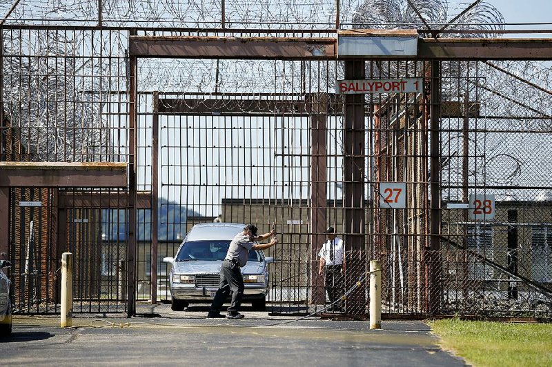 A hearse carries the body of executed inmate Robert Van Hook from prison Wednesday in Lucasville, Ohio. 