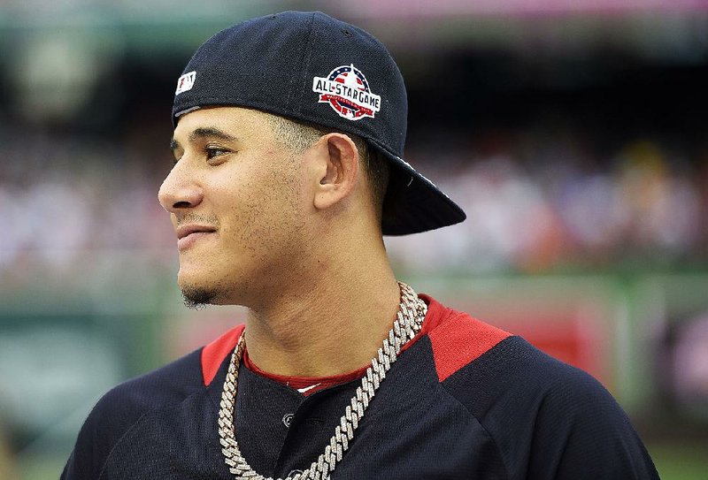 Shortstop Manny Machado was traded by the Baltimore Orioles on Wednesday to the Los Angeles Dodgers for five minor-league prospects.   