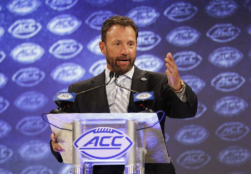 North Carolina Coach Larry Fedora disputed the relationship between football and chronic traumatic encephalopathy, saying such concerns are softening the game.  