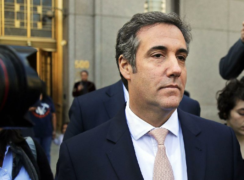 In this April 26, 2018 file photo, Michael Cohen leaves federal court in New York. 