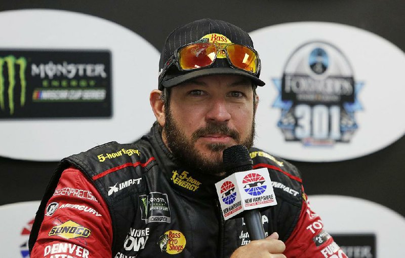 NASCAR Cup Series driver Martin Truex Jr. listens to a question from the media before auto racing practice Friday, July 20, 2018, at New Hampshire Motor Speedway in Loudon, N.H. 