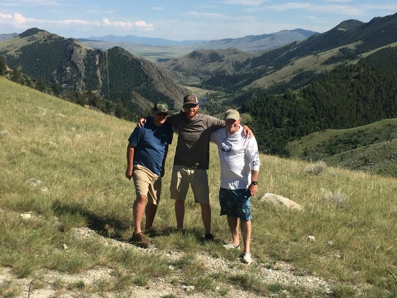 Special to NWA Democrat-Gazette/Ethan Bowe Clay Henry, Adam Bowe and Wayne Reed are at 7,000 feet with the Big Hole River below them.