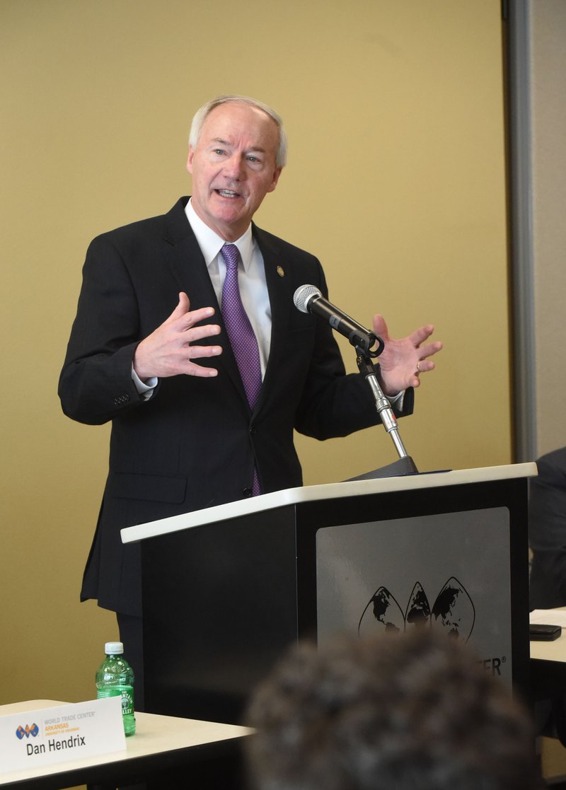 NWA Democrat-Gazette/FLIP PUTTHOFF
Gov. Asa Hutchinson delivers remarks Tuesday Jan. 16 2018 at the North American Free Trade Agreement summit in Rogers.