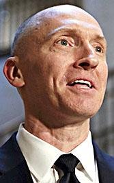 In this Nov. 2, 2017, file photo, Carter Page speaks with reporters following a day of questions from the House Intelligence Committee on Capitol Hill in Washington. 